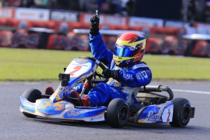 Praga's Jack Westbury celebrates his victory in the ultra competitive Mini Max (Pic: Coopers Photography)