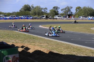 Harry Arnett crossing the line for victory in Cadet 9 (Pic: Coopers Photography)