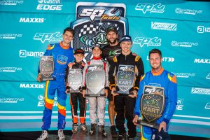 Supercars driver Nick Percat (far left) with his fellow podium finishers from the KartClass outfit (Pic: Pace Images)